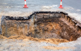 sinkhole in asphalt