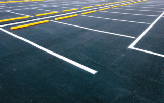 empty parking lot with newly painted white lines